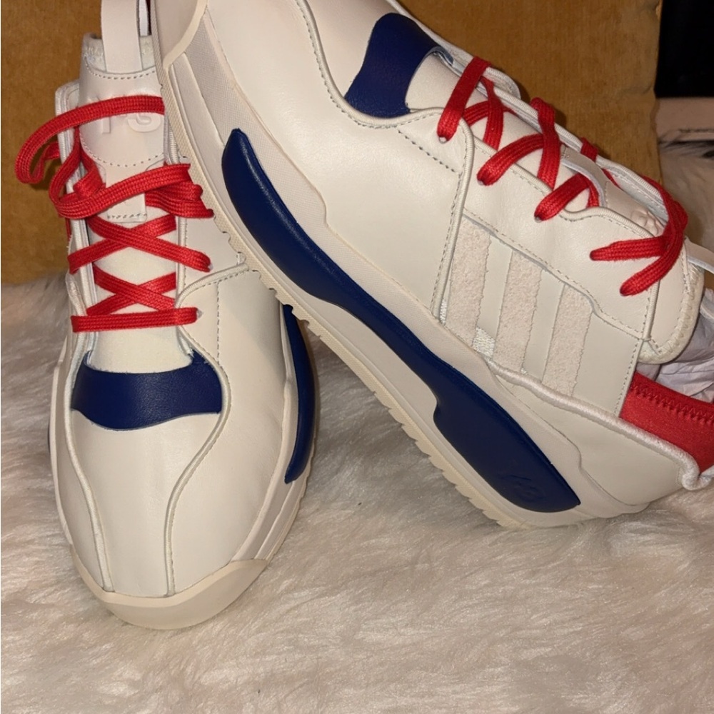 White Sneakers with Red and Blue Accents